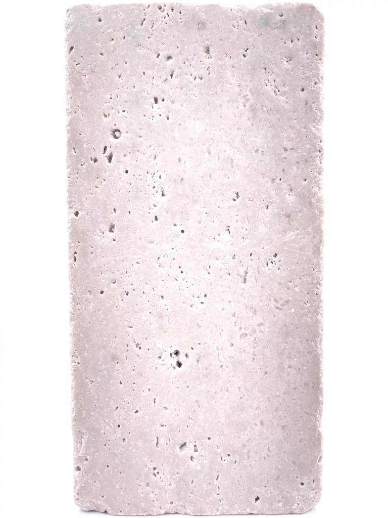 Jazz White Limestone with an anti-finish and tumbled surface