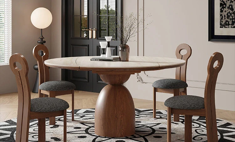 Elegant sintered stone dining table with a wooden base, surrounded by four wooden chairs in a modern dining room